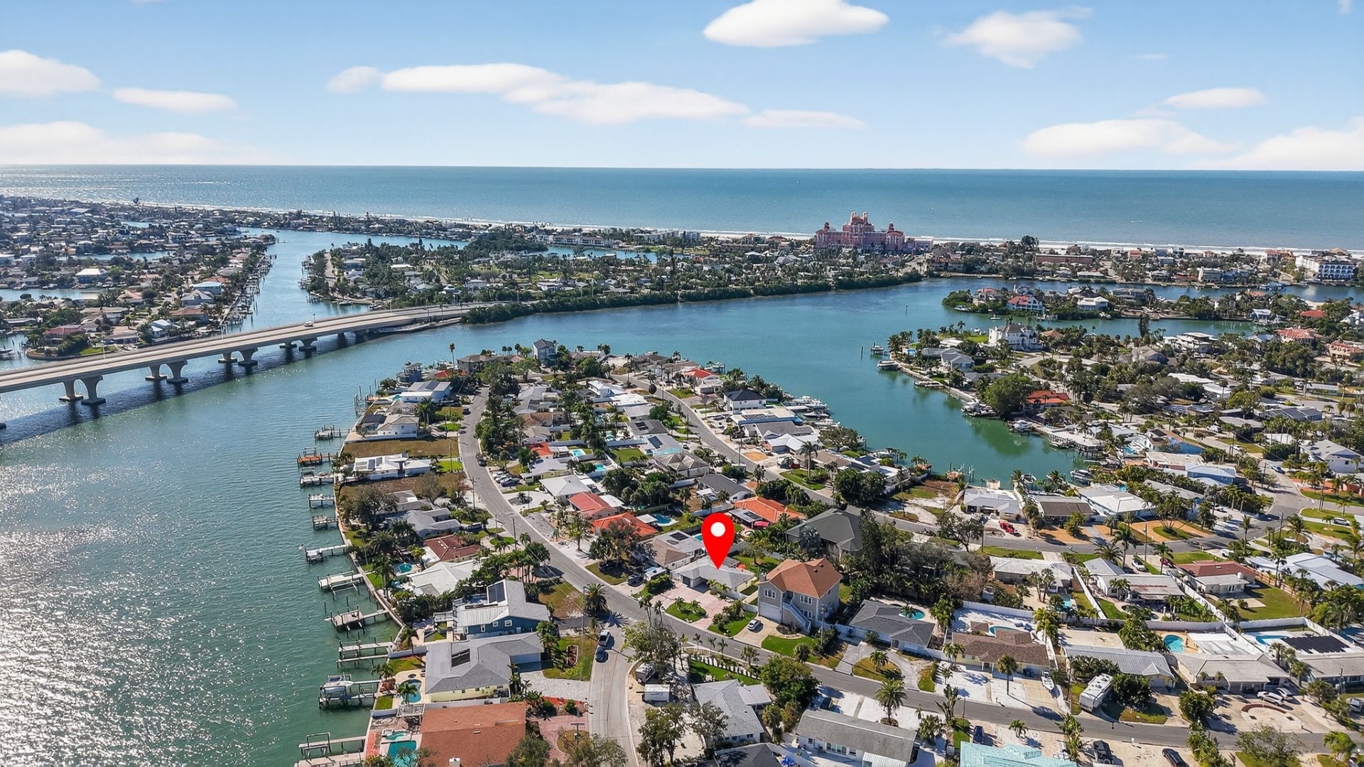 Aerial view of the neighborhood with the Intercoastal Waterway and Gulf beyond